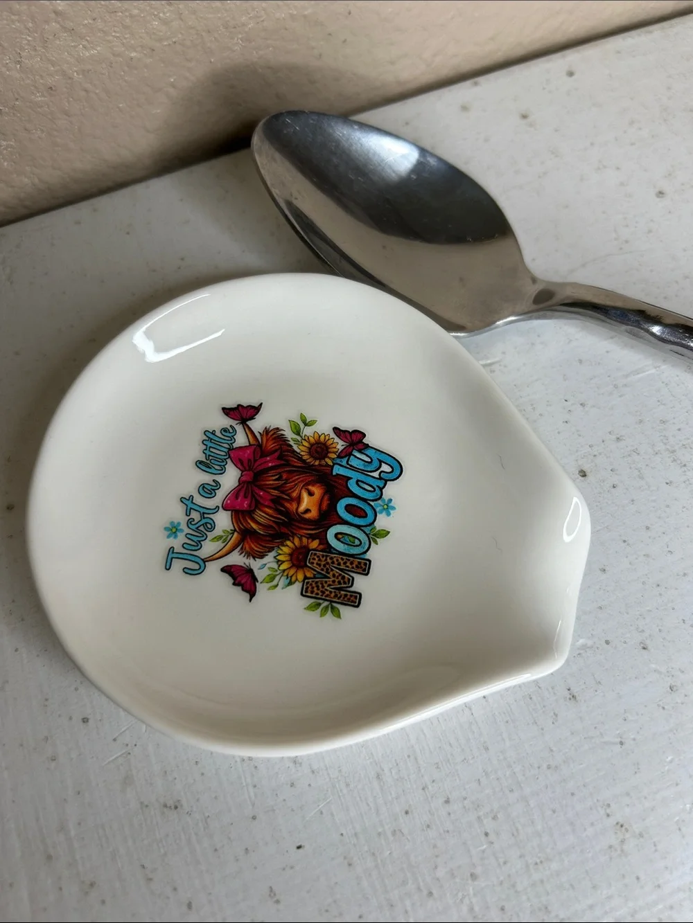 Ceramic Spoon Rest with 'Just a Little Moody' Cow Illustration - White